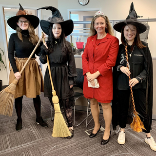 People dress up as witches and the Queen.