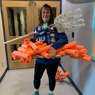 A woman dressed as Kraft Dinner for Halloween