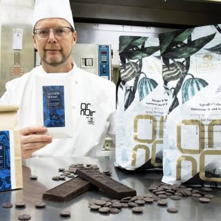 VIU Baking Instructor Ken Harper displays the new exclusive VIU chocolate product, known as Spindle Whorl.