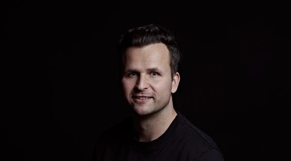 Profile portrait of Dom Dawson