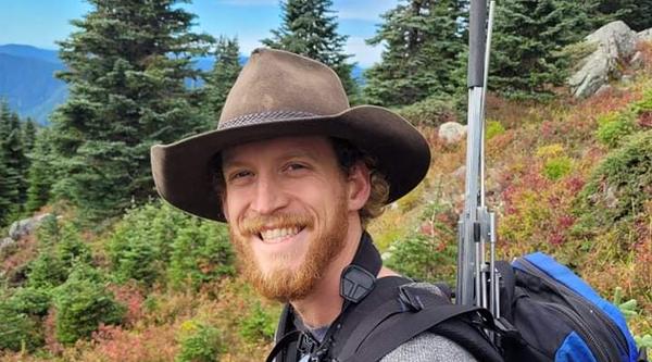 Kevin Gourlay hikes through the backcountry.