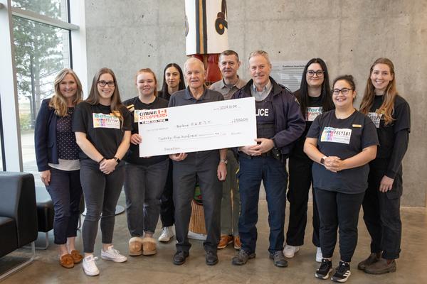 Group of VIU Nursing students accept a cheque