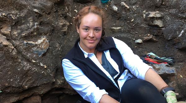 Samantha Good sits in her excavation square during the dig she attended in the Drimolen Palaeocave system.