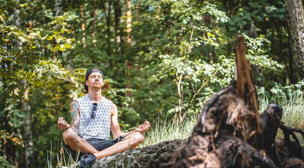 Man meditating in nature