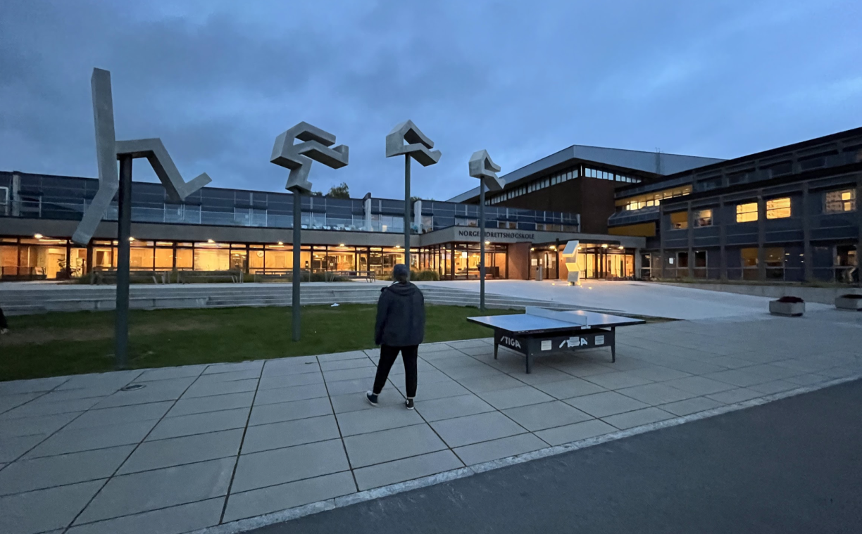 Sara Osbourne outside the campus in Norway at dusk