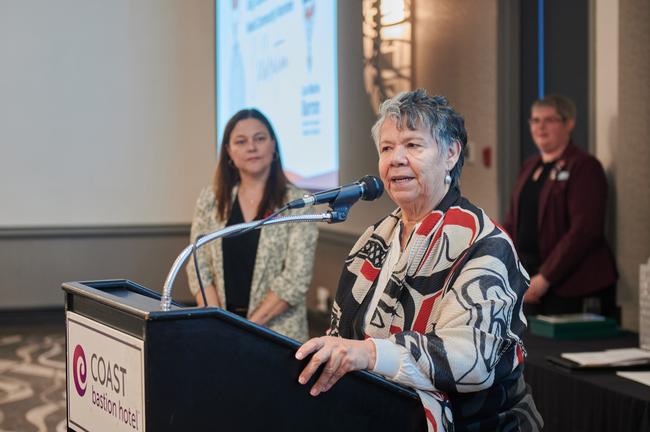 Geraldine Manson speaks at the podium