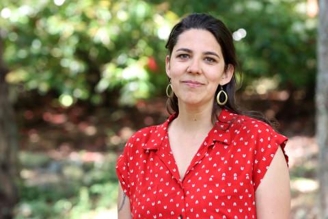 Becky Thiessen, wearing a red and white polka dot shirt.