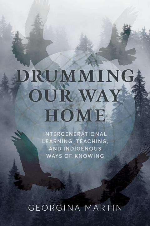 Cover of the book Drumming Our Way Home. A foggy day with trees and silhouettes of birds over a round globe.