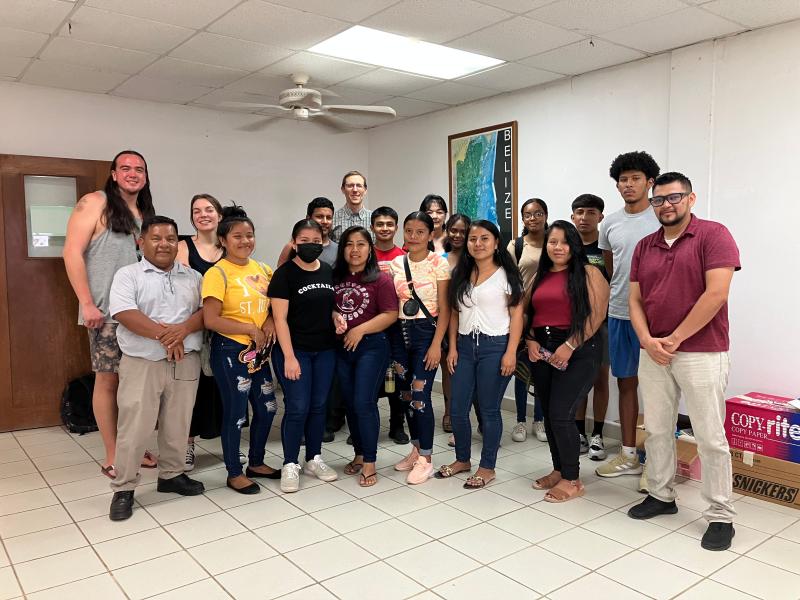 Darrell Harvey and students in Belize