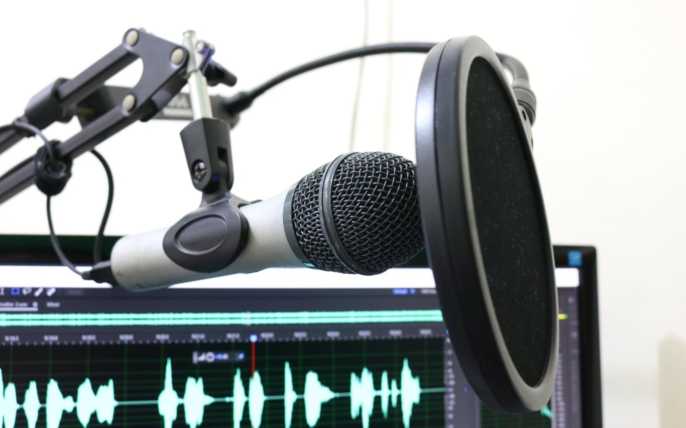 A black podcast microphone.