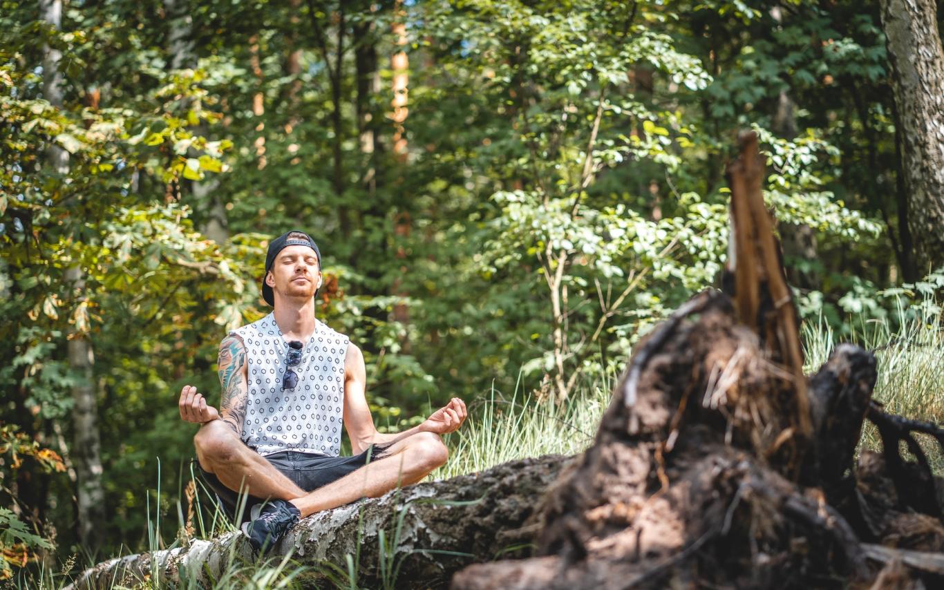 Man meditating in nature