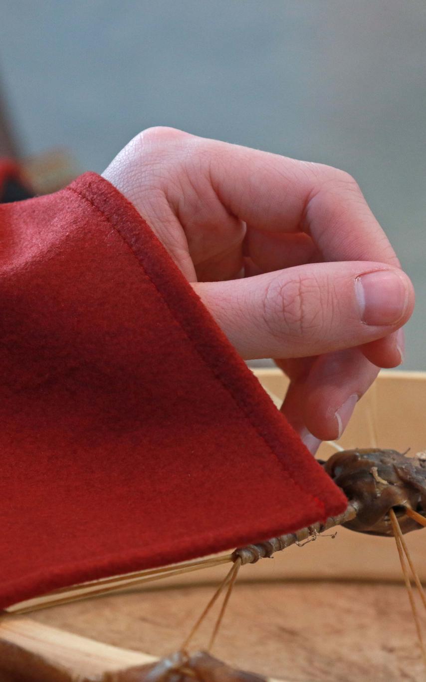 A hand resting on a drum